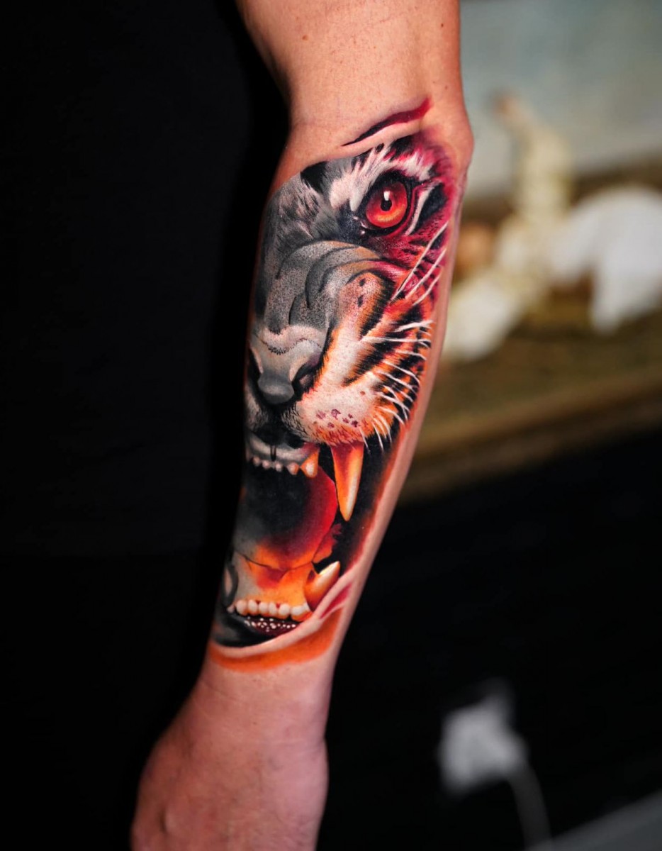 tiger head on hand