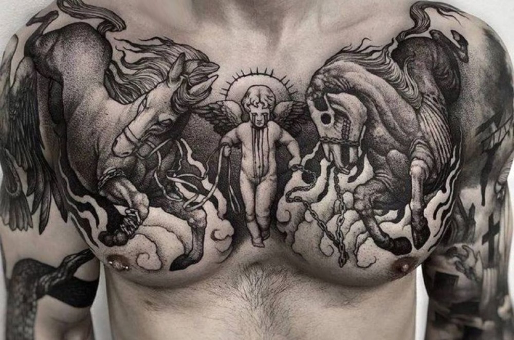 saint tattoo on chest