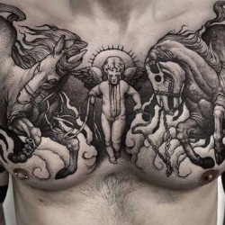 saint tattoo on chest