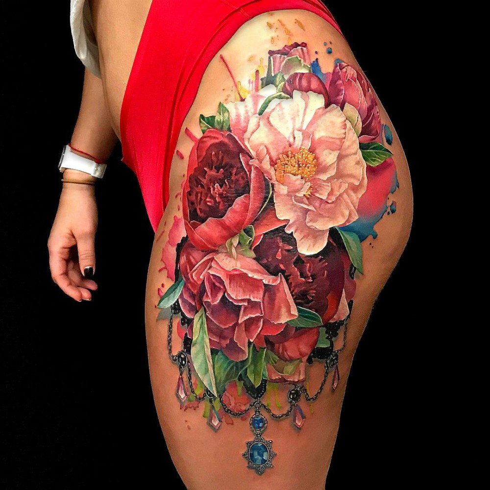 flowers tattoo by angry fox tattoo