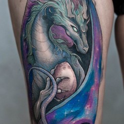 green dragon tattooed on the thigh
