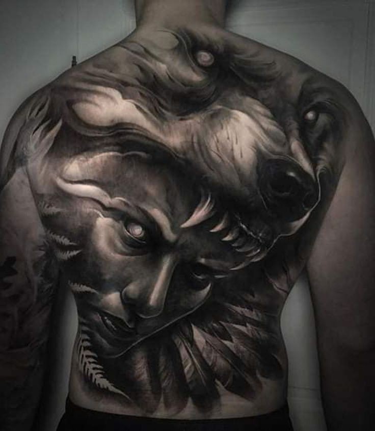 indian face and wolf tattoo