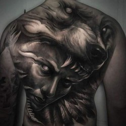 indian face and wolf tattoo