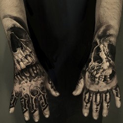skulls on hands for men tattoo ideas