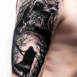 tattooed crows in wood