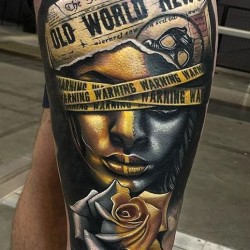 warrning face and rose tattoo