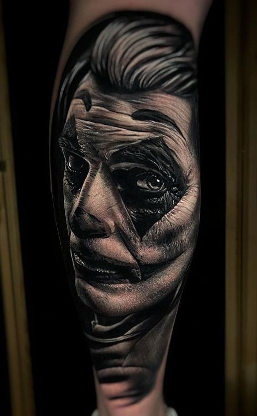 joker face tattoo