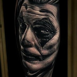 joker face tattoo