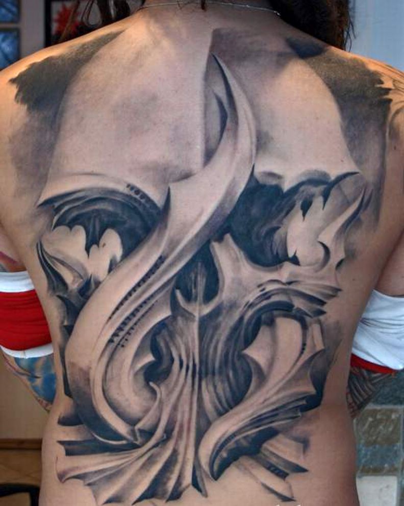 large skull tattoo on the back