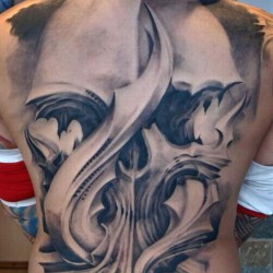 large skull tattoo on the back