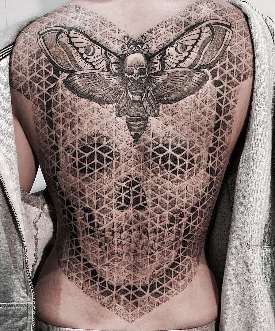 moth skull tattoo on back