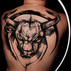 bull tattoo on back