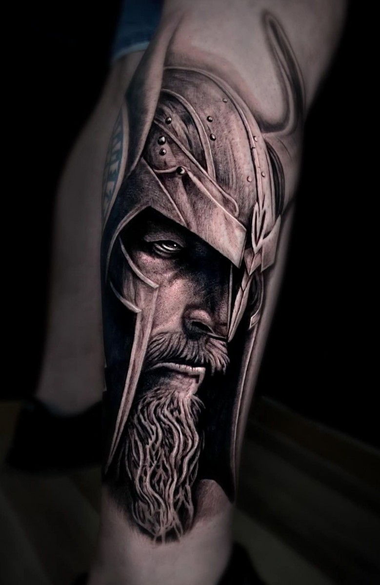 Viking tattooed on the calf