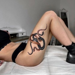 Snakes thigh tattoo,snake