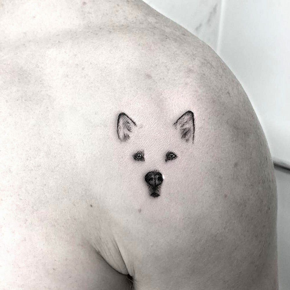 husky tattoo on the shoulder