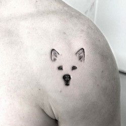 husky tattoo on the shoulder