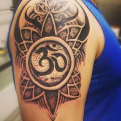 complex om tattoo design