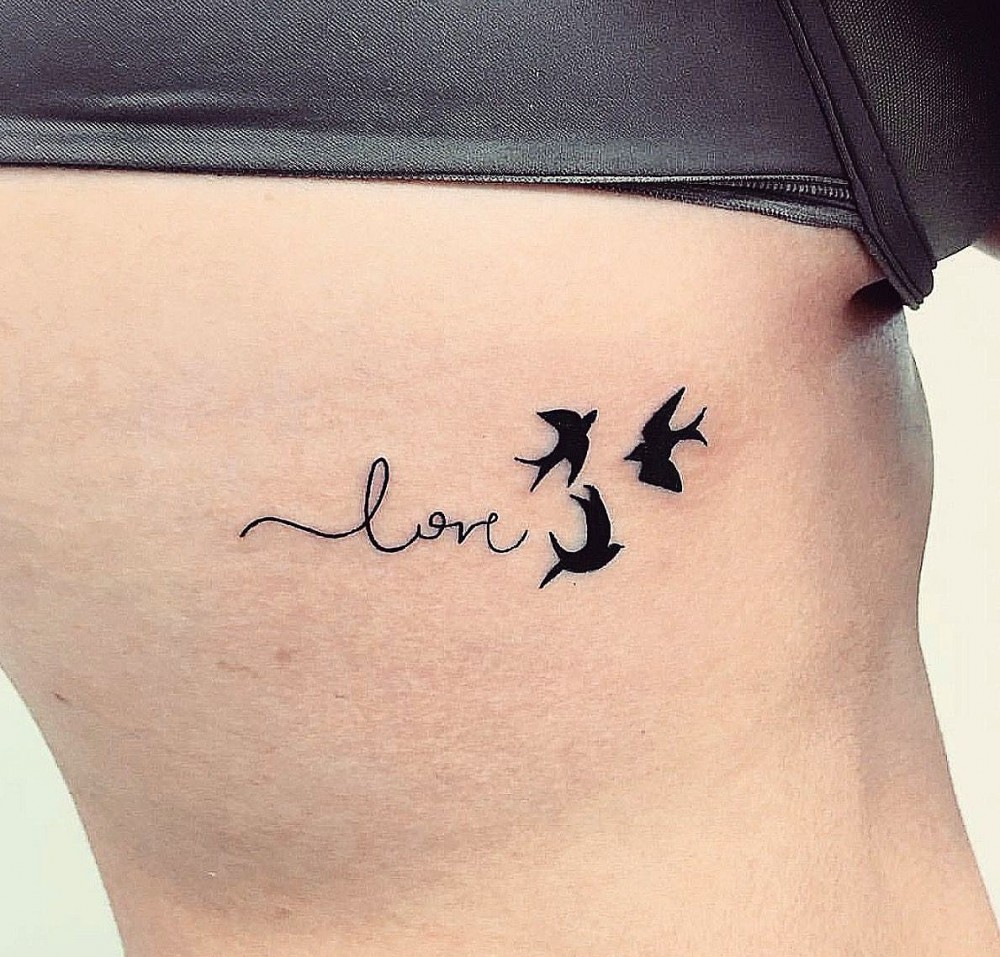 lowe swallows tattoo on ribs