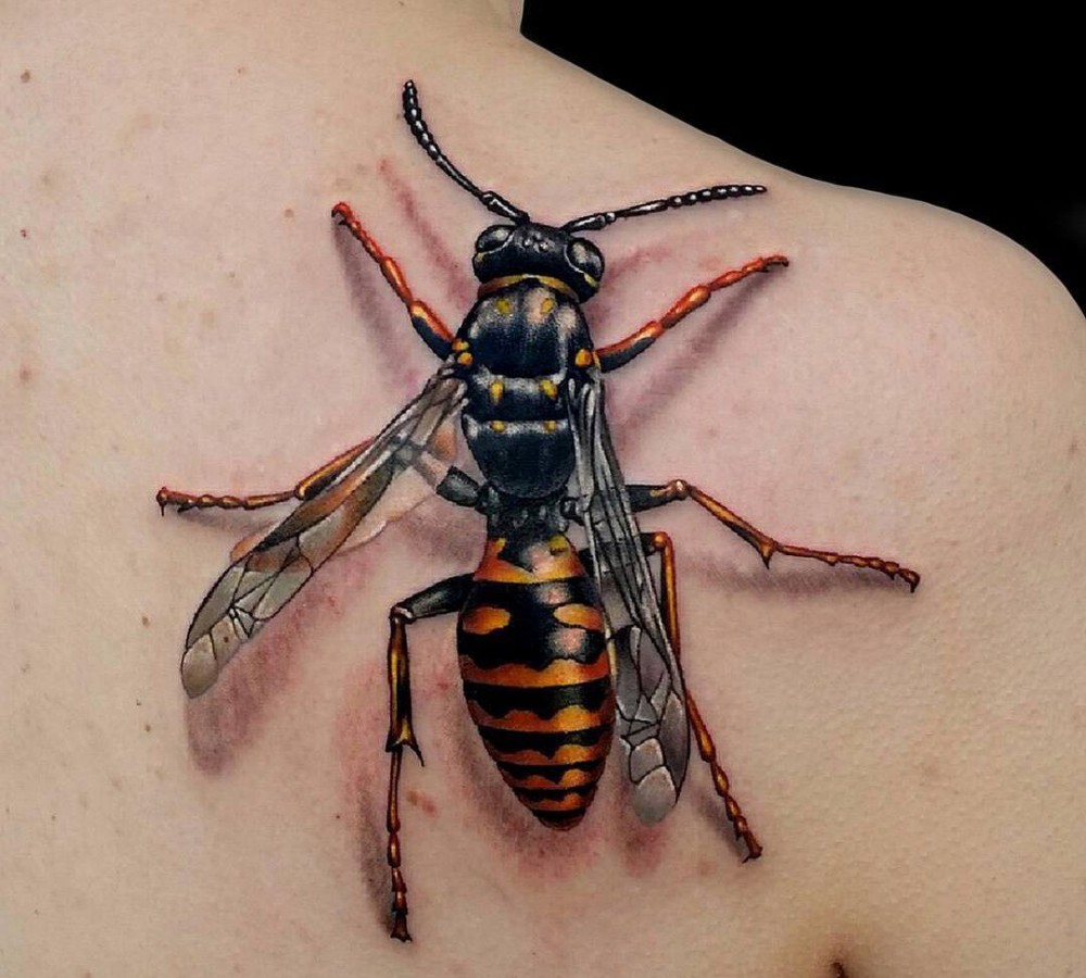 wasp tattoo on back