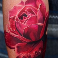 red flower for girl tattoo