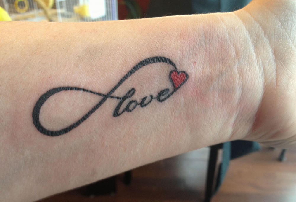infinity heart tattoo on wrist