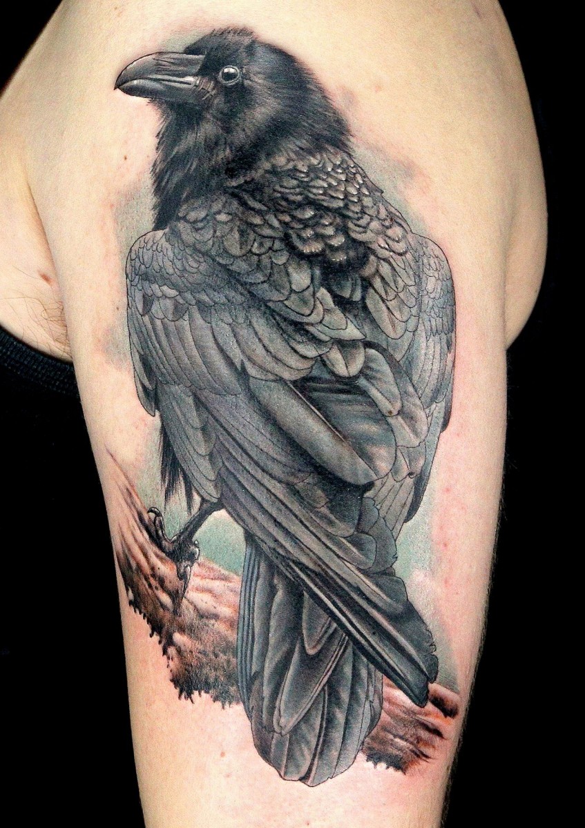tattooed crows on shoulder