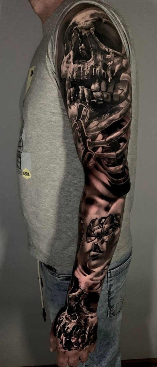 full arm tattoo with skulls