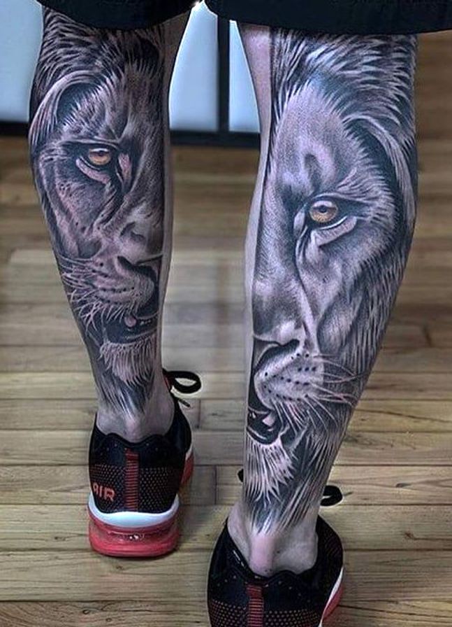 white lions tattooed on calves