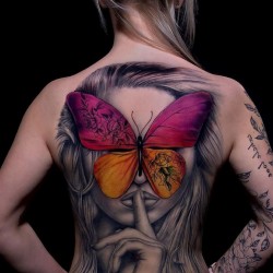Butterfly Portrait tattoo on her back