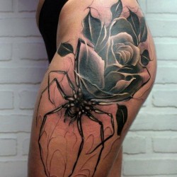 spider rose tattoo on hip