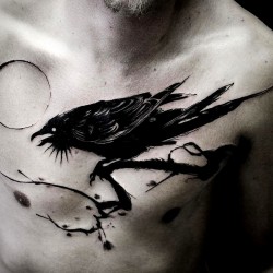 male chest ink crow tattoo pattern