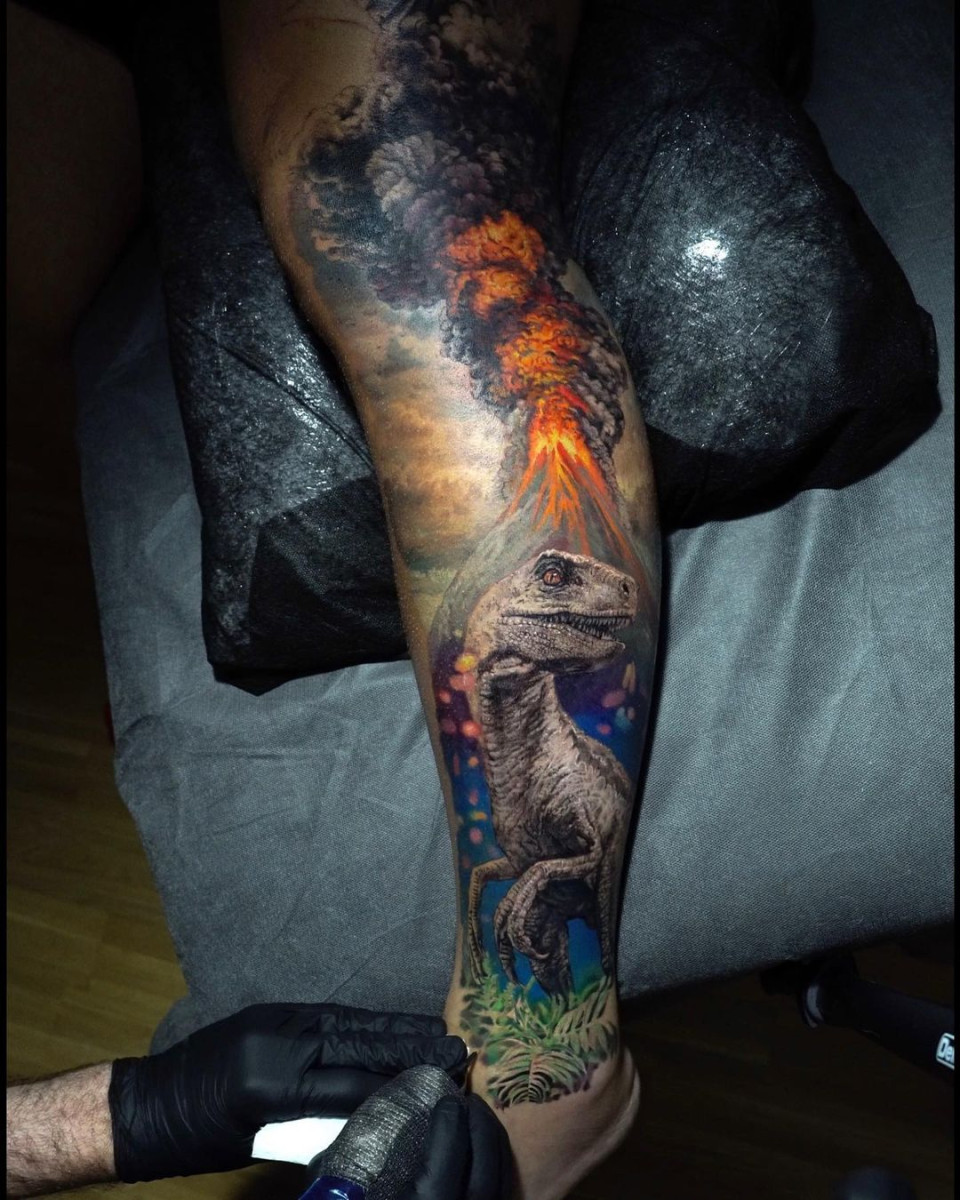 dinosaur volcano tattoo