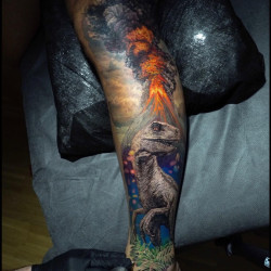 dinosaur volcano tattoo