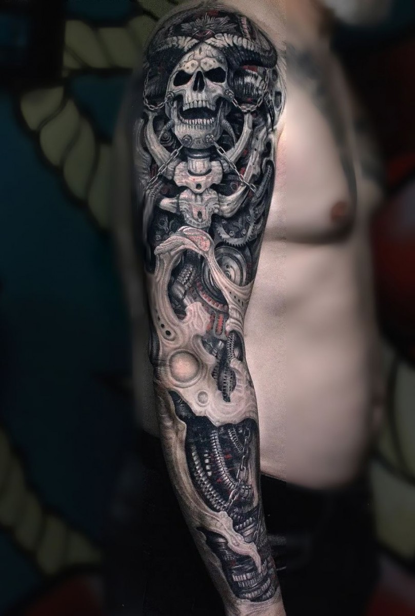 biomechanical,skull tattoo on shoulder