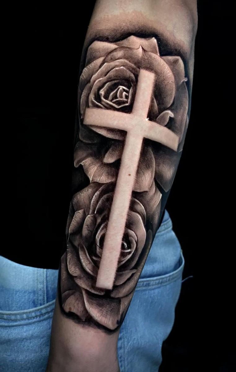 cross on roses tattoos on hand