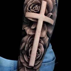 cross on roses tattoos on hand