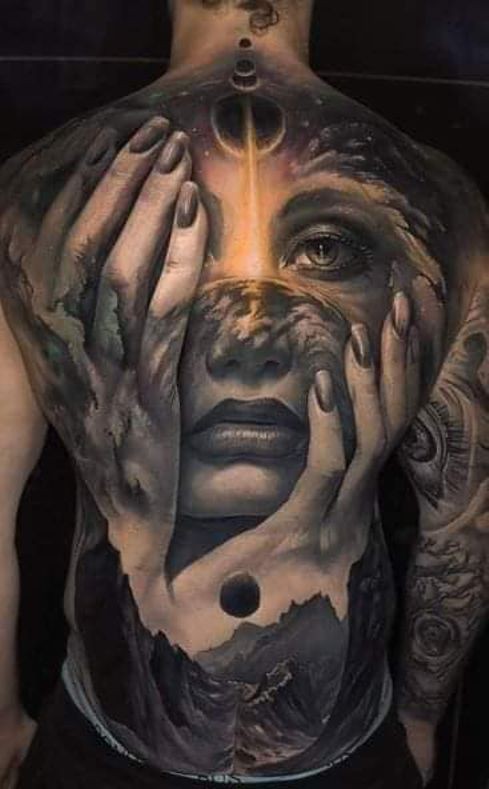 face in hand amazing tattoo
